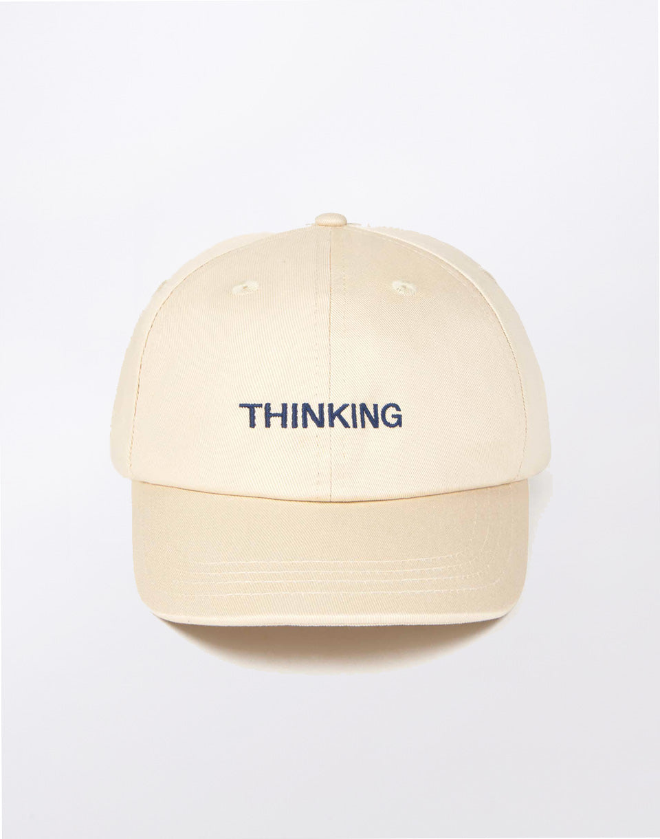 Casquette Chris en ivoire pensant
