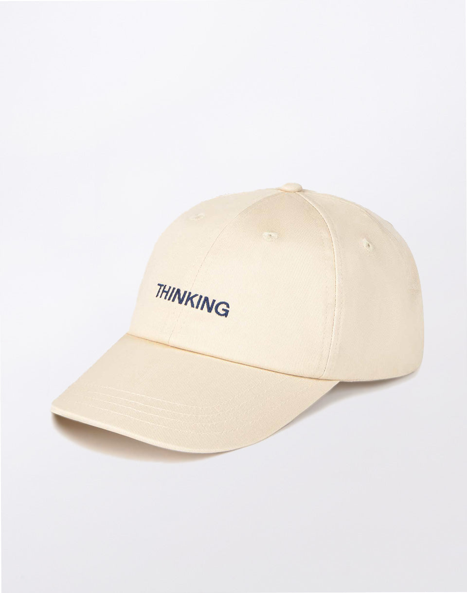 Casquette Chris en ivoire pensant