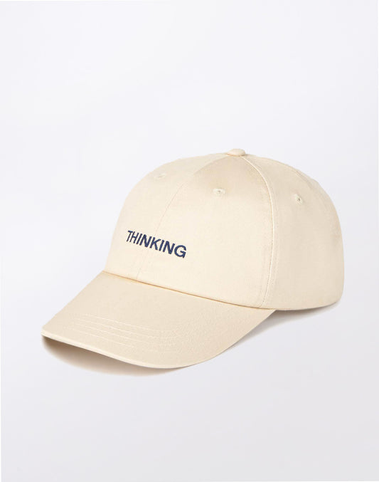 Casquette Chris en ivoire pensant
