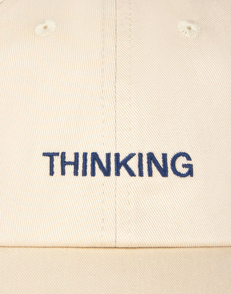 Casquette Chris en ivoire pensant