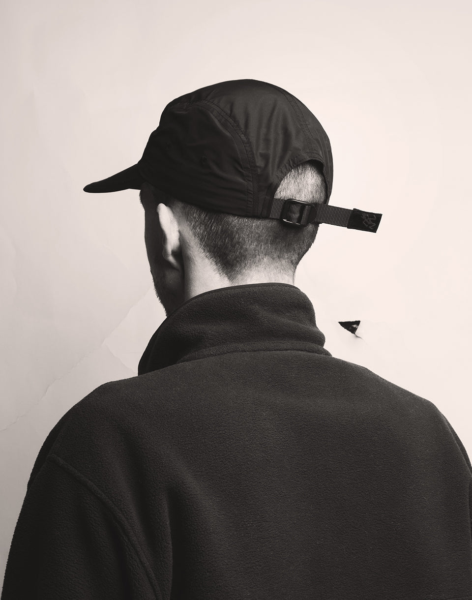 Capuchon à jet de coquille