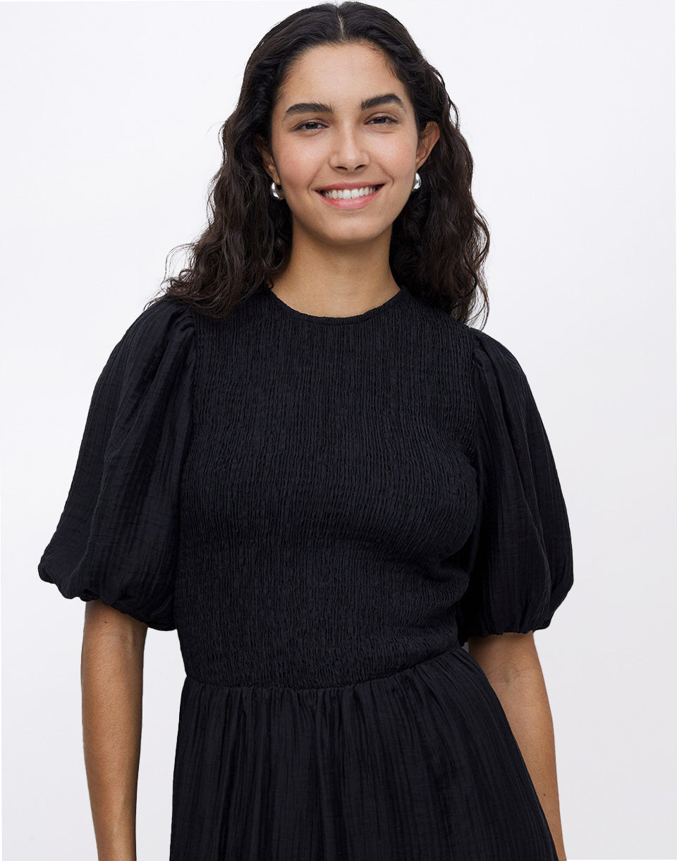 Robe longue à manches bouffantes