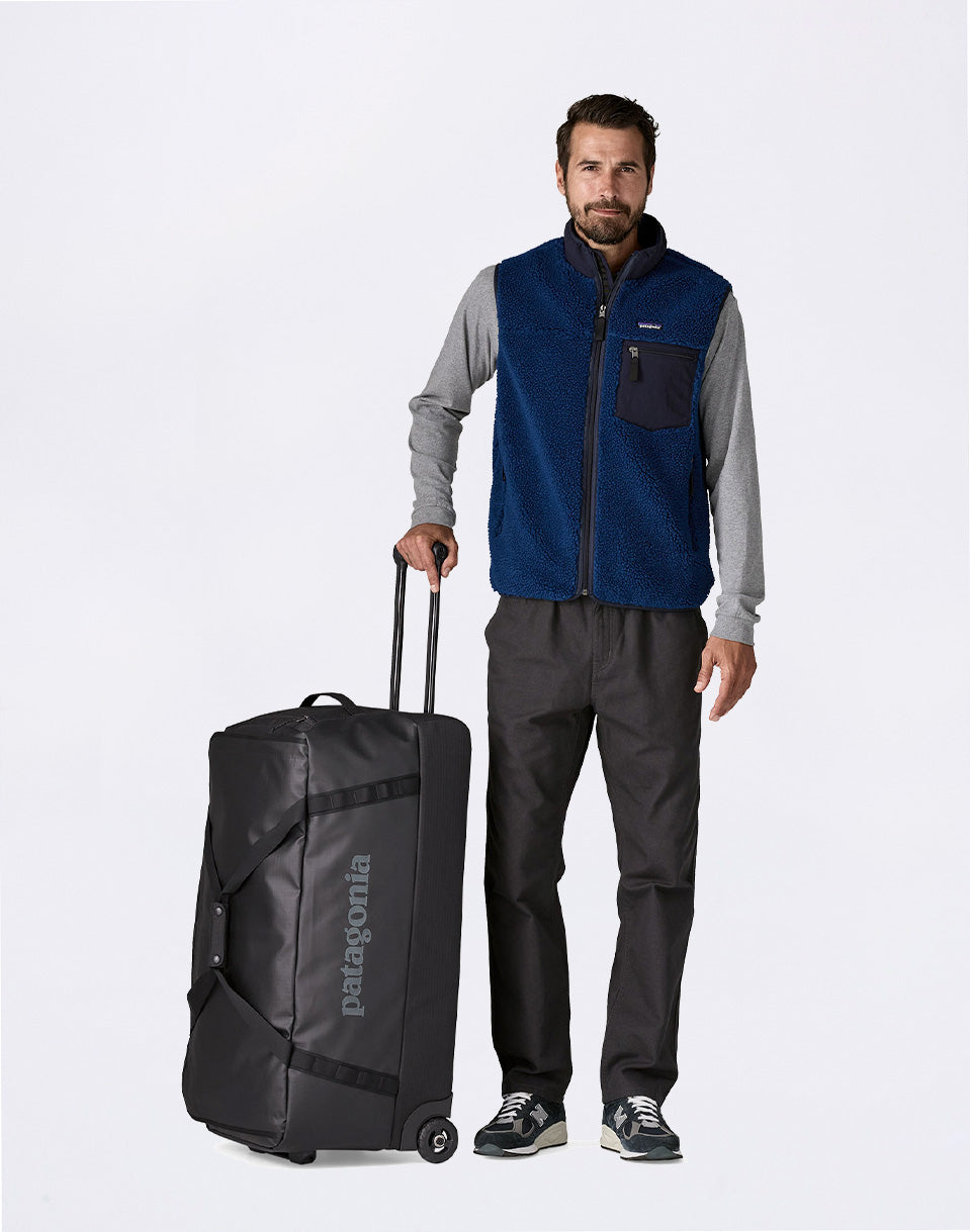 Black Hole Wheeled Duffel 100L