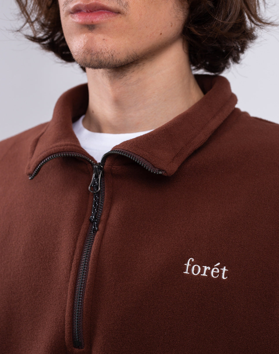 Mouvement à moitié zip