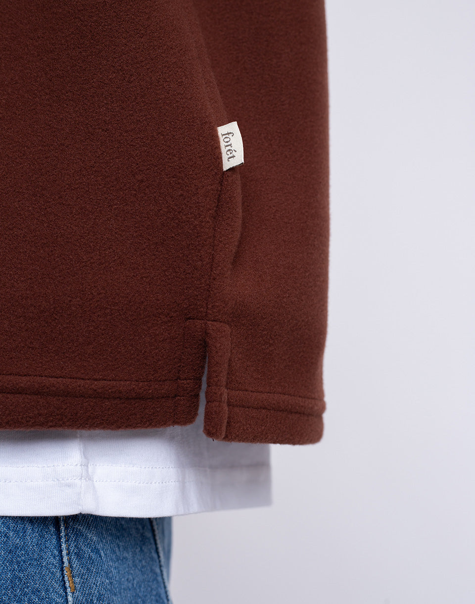 Mouvement à moitié zip